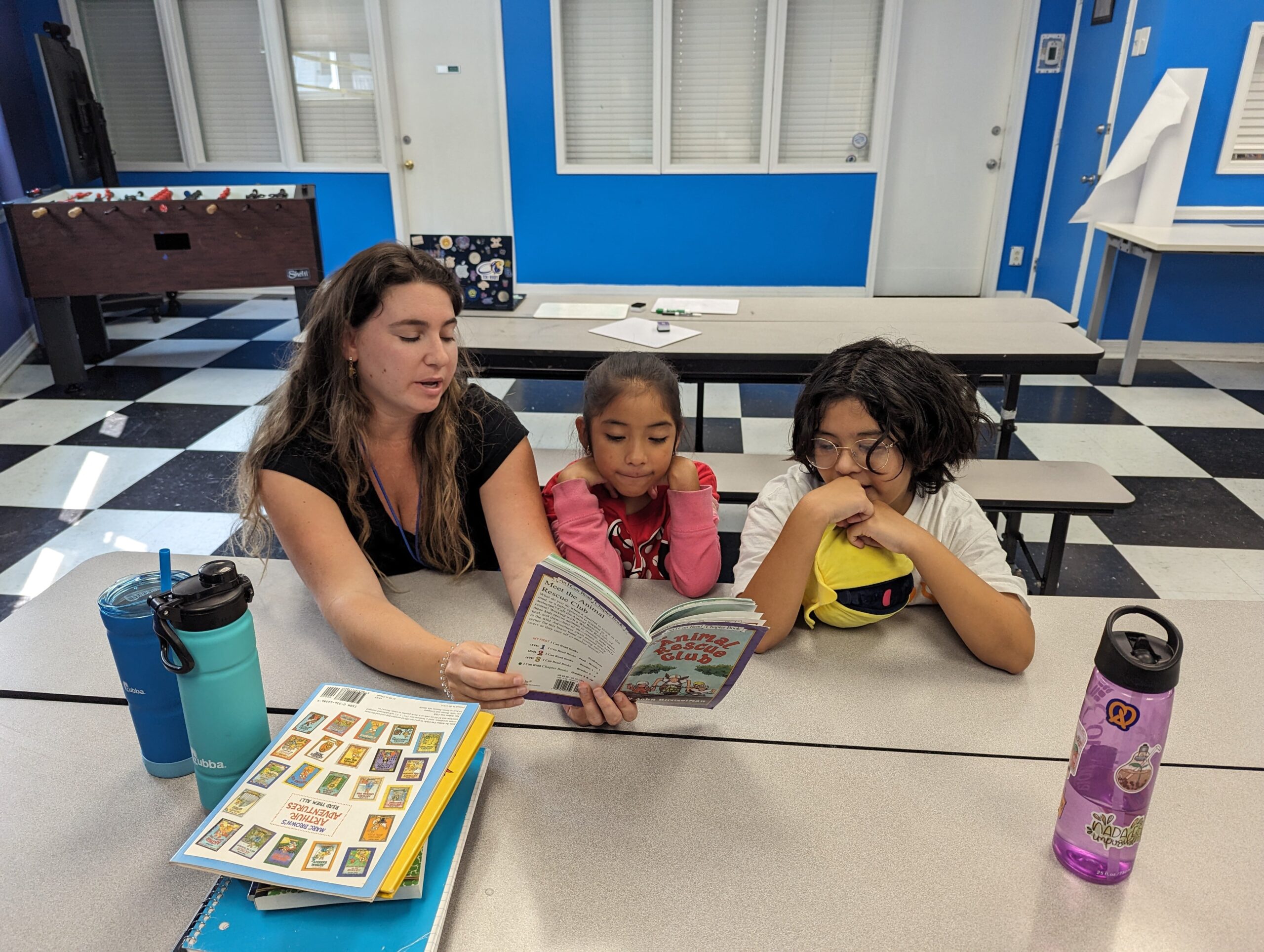 Tutor and scholars reading